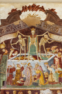 Clusone, Oratory of Disciplini or St. Bernardino, façade: frescoes with the Triumph of Death on