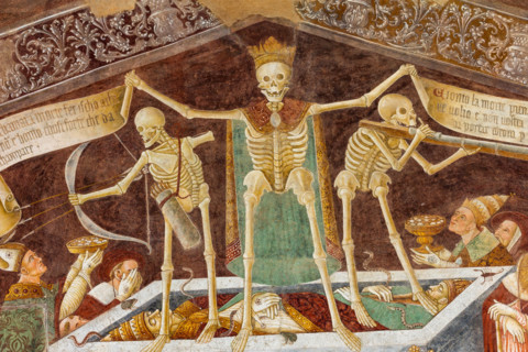 Clusone, Oratory of Disciplini or St. Bernardino, façade: frescoes with the Triumph of Death on