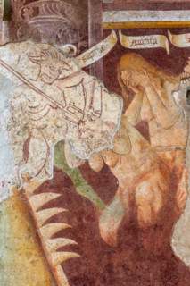 Clusone, Oratory of Disciplini or St. Bernardino, façade: frescoes with the Triumph of Death on
