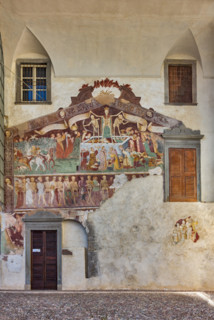 Clusone, Oratory of Disciplini or St. Bernardino, façade: frescoes with the Triumph of Death on