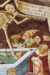 Clusone, Oratory of Disciplini or St. Bernardino, façade: frescoes with the Triumph of Death on