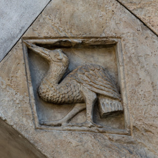 Fidenza, Duomo (Cattedrale di San Donnino), facciata, portale sinistro, protiro, serie di losanghe
