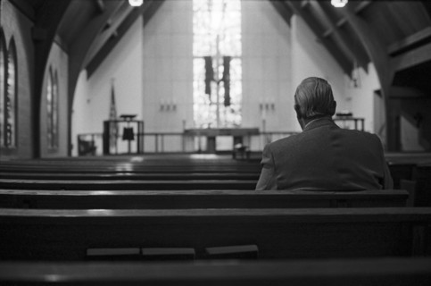 Man Sitting Alone in Church, Rear View