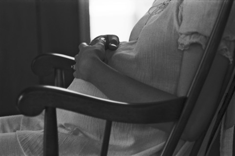 Pregnant Woman With Hands on Belly