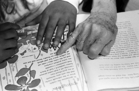 Hands of Student and Teacher