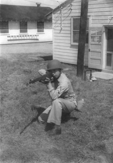 Soldier Displaying Proper Shooting Position During Training Session, WWII, 2nd Battalion, 389th Infantry, US Army Military Base Indiana, USA, 1942