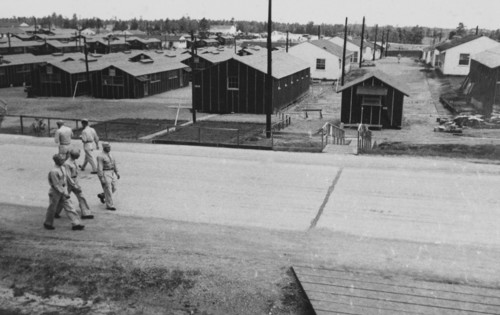 Group of Soldiers Walking Near Military Barracks, WWII, 2nd Battalion, 389th Infantry, US Army Military Base Indiana, USA, 1942