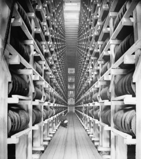 Worker Sitting in Rack Warehouse, Hiram Walker & Sons, Walkerville, Ontario, Canada, Detroit Publishing Company, 1910
