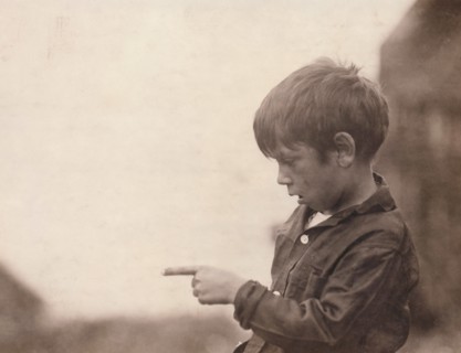 7-year-old Boy with Injured Finger while Cutting Sardines at Cannery, Eastport, Maine, USA, Lewis Hine, 1911