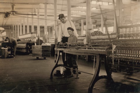 Young "Band-Boy" and Overseer, Yarn Mill, Yazoo City, Mississippi, USA, Lewis Hine, 1911