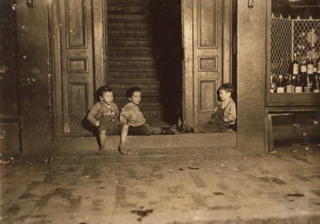 Three Young Children Hanging Out in Doorway Late at Night, Boston, Massachusetts, USA, Lewis Hine, 1909