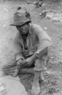 Florida Migratory Agricultural Worker Playing Cards during Lunch hour at Grading Station, Belcross, North Carolina, USA, Jack Delano for Farm Security Administration, July 1940