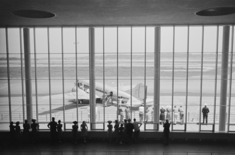 Visitors Watching Airplanes through Window of Main Waiting Room at Municipal Airport, Washington DC, USA, Jack Delano for Farm Security Administration, July 1941