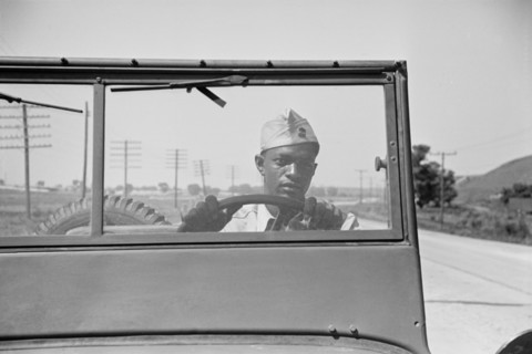 Driver of Jeep of a Reconnaissance Unit, Fort Riley, Kansas, USA, Jack Delano for Office of War Information, April 1942