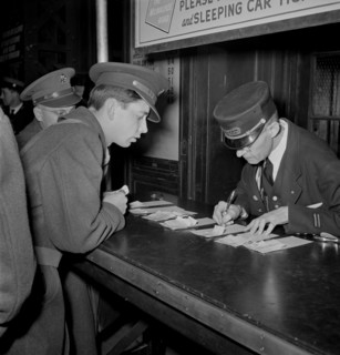 Soldier Checking Train Reservation, Union Station, Chicago, Illinois, USA, Jack Delano for Office of War Information, January 1943