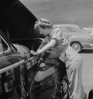 Miss Natalie O'Donald, a Garage Attendant at the Atlantic Refining Company Garages, Philadelphia, Pennsylvania, USA, Jack Delano for Office of War Information, June 1943