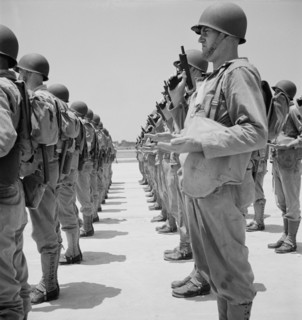 Enlisted Men Learning how to Handle a Pistol, Standing at "Inspect Pistols", Air Service Command, Daniel Field, Georgia, USA, Jack Delano for Office of War Information, July 1943