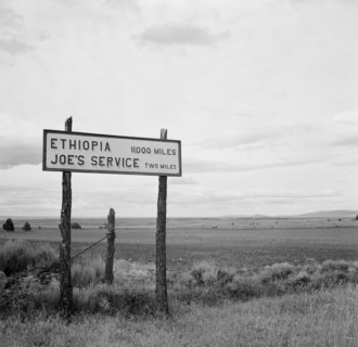 Sign on Highway near Madras, Oregon, USA, Arthur Rothstein for Farm Security Administration, July 1936