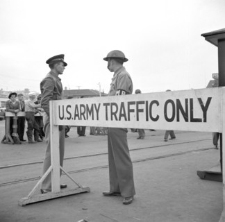 Army Sentries Standing Guard at Transport Dock one day after Japanese Attack on Pearl Harbor, San Francisco, California, USA, John Collier for Office of War Information, December 8, 1941