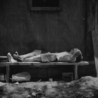 Woman Worker Relaxing on Lunch Break, U.S. Department of Agriculture Timber Salvage Sawmill, Turkey Pond, New Hampshire, USA, John Collier for Office of War Information, June 1943