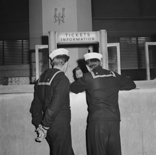 Two Sailors at Information Desk at Greyhound Bus Terminal, Chicago, Illinois, USA, Esther Bubley for Office of War Information, September 1943
