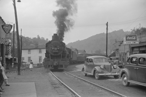 Train Pulling Through Center of Town, Osage, West Virginia, USA, Marion Post Wolcott for Farm Security Administration, September 1938