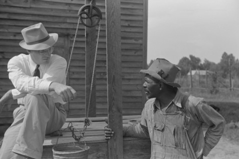 Farm Security Administration (FSA) Supervisor Inspecting Rehabilitation Borrower's Well, Greene County, Georgia, USA, Marion Post Wolcott for Farm Security Administration, June 1939