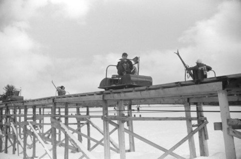 Group of People on Ski Lift, Cranmore Mountain, North Conway, New Hampshire, USA, Close-Up, Marion Post Wolcott for Farm Security Administration, March 1940