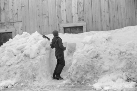 Young Boy Shoveling Snow from Barn Window after Heavy Snowfall, near Woodstock, Vermont, USA, Marion Post Wolcott for Farm Security Administration, April 1940