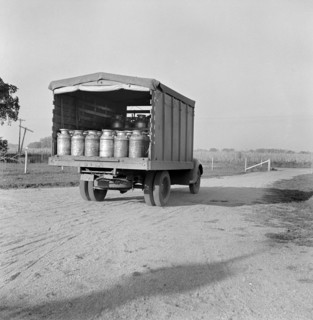 Milk Truck Leaving Two Rivers Non-Stock Cooperative Association, a Farm Security Administration (FSA) Project, Waterloo, Nebraska, USA, Marion Post Wolcott for Farm Security Administration, September ...