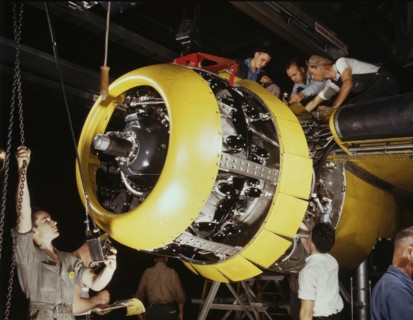 Workers Mounting Motor on Fairfax B-25 Bomber, North American Aviation Plant, Inglewood, California, USA, Alfred T. Palmer for Office of War Information, 1942