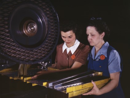 Two Female Workers Punching Holes in Frame Member for B-25 Bomber, North American Aviation, Inc, Inglewood, California, USA, Alfred T. Palmer for Office of War Information, June 1942