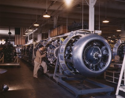Worker Adding Cowling and Control Rods to Motors of B-25 Bombers on Assembly Line, North American Aviation Plant, Inglewood, California, USA, Alfred T. Palmer for Office of War Information, October 19...