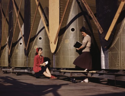 Female Inspectors, One Seated and One Standing, Making Notes while Checking Cargo Transport Inner Wings before Assembly on Fuselage, Douglas Aircraft Company, Long Beach, California, USA, Alfred T. Pa...