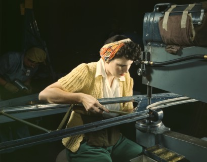 Female Riveting Machine Operator of B-17F Bomber, Douglas Aircraft Company, Long Beach, California, USA, Alfred T. Palmer for Office of War Information, October 1942