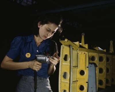 Female Worker Operating Hand Drill on Horizontal Stabilizer for Vultee "Vengeance" A-31 Dive Bomber, Nashville, Tennessee, USA, Alfred T. Palmer for Office of War Information, February, 1943