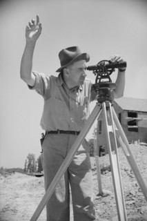 Surveyor Working in Model Community Planned by Suburban Division of U.S. Resettlement Administration, Greenbelt, Maryland, USA, Carl Mydans for U.S. Resettlement Administration, July 1936