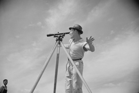 Surveyor Working in Model Community Planned by Suburban Division of U.S. Resettlement Administration, Greenbelt, Maryland, USA, Carl Mydans for U.S. Resettlement Administration, July 1936