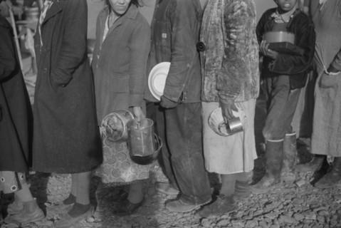 Group of People at Mealtime in Flood Refugee Camp, Forrest City, Arkansas, USA, Walker Evans for U.S. Resettlement Administration, March 1936