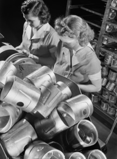 Two Female Workers Inspecting Heat-Treated Pistons prior to Brinnell hardness Testing at Aluminum Factory Converted to War Production, Aluminum Industries, Inc., Cincinnati, Ohio, USA, Alfred T. Palme...