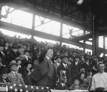 U.S. President Warren Harding throwing out First Baseball of Season, Griffith Stadium, Washington DC, USA, National Photo Company, April 1923