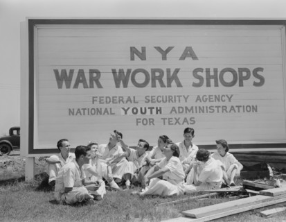 Young National Youth Administration (NYA) Trainees for War Jobs Watching Navy Planes they are Learning to Service at Naval Air Base, Corpus Christi, Texas, USA, Howard R. Hollem for Office of War Info...