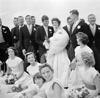Jackie Bouvier Kennedy and John F. Kennedy, in Wedding Attire, with Members of Wedding Party, Newport, Rhode Island, USA, by Toni Frissell, September 12, 1953