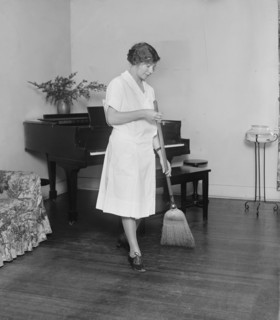 Young Woman Sweeping Floor, College Home Economics Class, Washington DC, USA, National Photo Company, December 1926