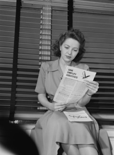Woman Reading Government Literature Regarding Rationing and Salvaging during World War II, Ann Rosener for Office for Emergency Management, February 1942
