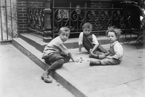 Three Young Boys Playing Game on Sidewalk, New York City, New York, USA, Bain News Service, July 1913