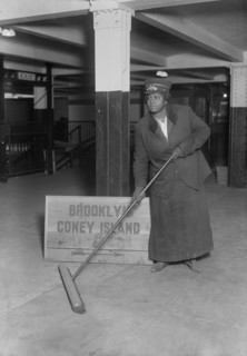 Female Subway Porter Cleaning Station, New York City, New York, USA, Bain News Service, 1917