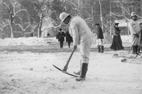 Man Clearing Snow from Street with Pickaxe, New York City, New York, USA, Bain News Service, January 1908