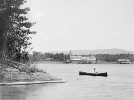 Man in Canoe with Saranac Inn in Background, Upper Saranac Lake, New York, USA, William Henry Jackson for Detroit Publishing Company, 1902