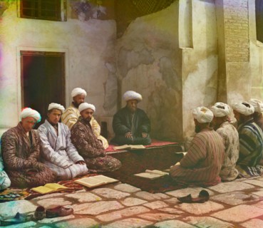Group of Men with Books Seated Around Carpet in Courtyard of Mosque, Samarkand, Uzbekistan, Russian Empire, Prokudin-Gorskii Collection, 1910